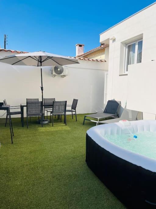 Maison 4 Personnes Avec Jacuzzi มาริญญาน ภายนอก รูปภาพ